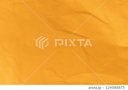 Rough yellow craft paper background Rough yellow craft paper background 124098975