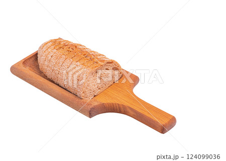 Buckwheat baguette sliced on a wooden board isolate. Buckwheat baguette sliced on a wooden board isolate. 124099036