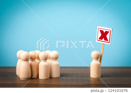 Diversity of opinions concept. Miniature human figures on a wooden table 124101076