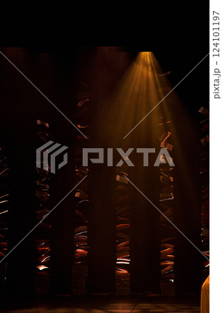 Spotlights illuminate empty stage brown background. 124101197