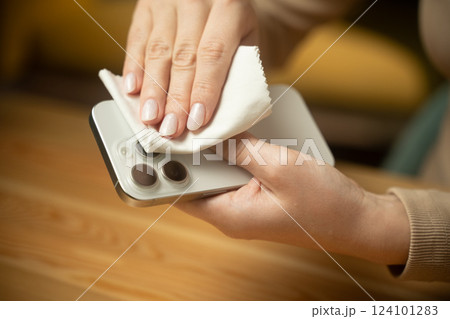 Wiping smartphone camera lenses for clearer pictures and enhanced performance at home Wiping smartphone camera lenses for clearer pictures and enhanced performance at home 124101283