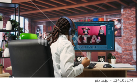 Graphic designer designing UX for AI software turning text prompt into photos. IT specialist drinking coffee using machine learning tech to build text to image AI generative models, camera B 124103174
