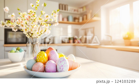 Easter eggs on green glass dish on a table in a modern kitchen. Vase with yellow flowers of a blooming mimosa in the warm light Easter decor for home. This is AI-generated item Easter eggs on green glass dish on a table in a modern kitchen. Vase with yellow flowers of a blooming mimosa in the warm light Easter decor for home. This is AI-generated item 124103289