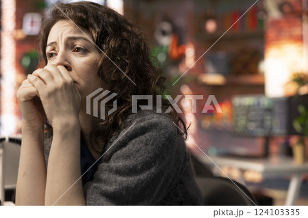 Stock market expert being worried and disappointed with the stock market crash, following financial trends on her PC and crying. Young woman exasperated and devastated about monetary losses. Stock market expert being worried and disappointed with the stock market crash, following financial trends on her PC and crying. Young woman exasperated and devastated about monetary losses. 124103335