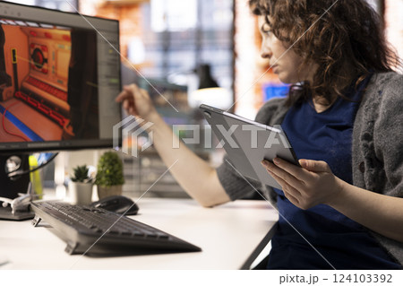 Game developer utilizes AI generated program to design spaceship station using deep learning and automation, futuristic environment enhanced by machine learning based solutions and cloud computing. 124103392