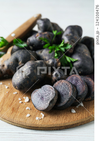 Concept of unusual vegetable - purple potato vegetable Concept of unusual vegetable - purple potato vegetable 124108476
