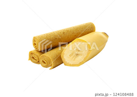 PNG, Three yellow rolls of fruit pastille and one half of banana, isolated on white background 124108488
