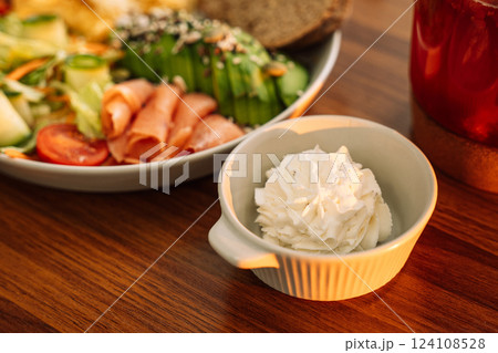 Healthy breakfast egg avocado greens and salad and raspberry tea Healthy breakfast egg avocado greens and salad and raspberry tea 124108528