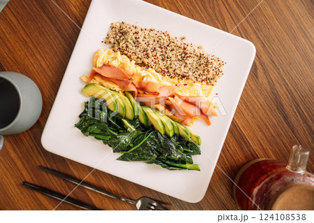 Hearty Breakfast with Salmon, Quinoa, Avocado 124108538