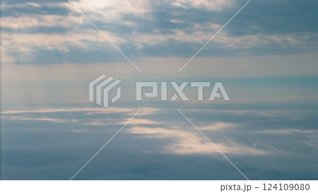 Serene Sky With Gentle Clouds and Sunlight Rays 124109080