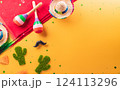 Cinco de Mayo holiday background made from maracas, cactus and hat on yellow background. 124113296