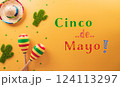 Cinco de Mayo holiday background made from maracas, cactus and hat on yellow background. 124113297