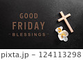 Good Friday and Holy week concept - A religious cross and flower on dark stone background. 124113298