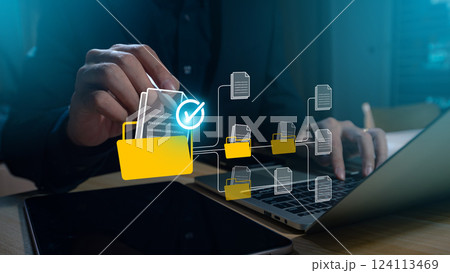 Document management concept: Businesswomen check electronic documents on a virtual screen within a Document Management System, utilizing process automation for efficient, paperless operations, For 124113469