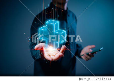 Businessman holding virtual blue plus sign to offer positive thing with thinking mindset or healthcare insurance symbol concept, like benefits, personal development, health insurance, growth concepts. Businessman holding virtual blue plus sign to offer positive thing with thinking mindset or healthcare insurance symbol concept, like benefits, personal development, health insurance, growth concepts. 124113553