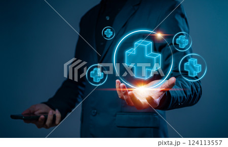 Businessman holding virtual blue plus sign to offer positive thing with thinking mindset or healthcare insurance symbol concept, like benefits, personal development, health insurance, growth concepts. Businessman holding virtual blue plus sign to offer positive thing with thinking mindset or healthcare insurance symbol concept, like benefits, personal development, health insurance, growth concepts. 124113557