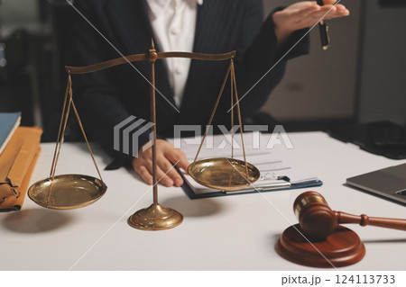 Judge gavel with Justice lawyers having team meeting at law firm background. Concepts of Law and Legal services. Judge gavel with Justice lawyers having team meeting at law firm background. Concepts of Law and Legal services. 124113733