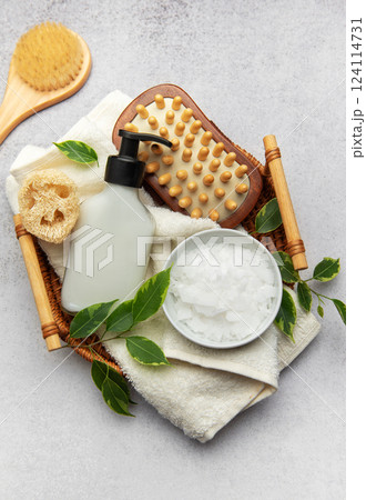 Magnesium flakes and eco friendly accessories creating relaxing spa setting Magnesium flakes and eco friendly accessories creating relaxing spa setting 124114731