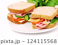 Healthy ham sandwich with cheese, tomatoes on white background 124115568