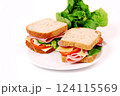 Healthy ham sandwich with cheese, tomatoes on white background 124115569