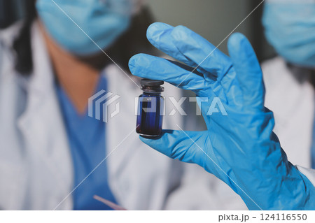 Researchers working in the clinical laboratory Researchers working in the clinical laboratory 124116550