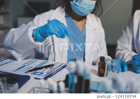 Researchers working in the clinical laboratory 124116554