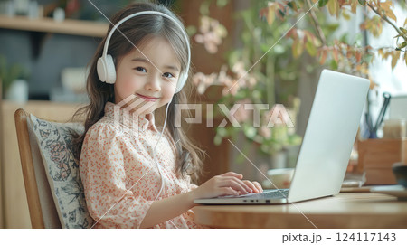 Beautiful smiling asian schoolgirl 10-12 years old 124117143