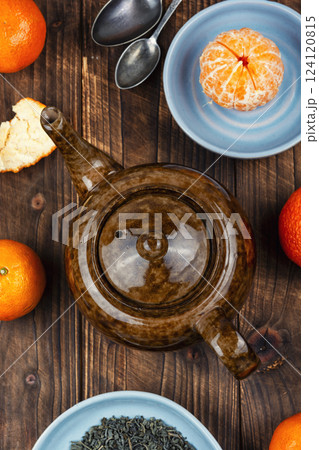 Mandarin tea in ceramic tea pot. 124120815