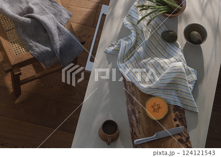 Fresh healthy vegetables and fruits on kitchen counter top view. Healthy lifestyle concept. Kitchen aesthetics concept 124121543