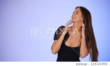 Happy woman enjoying a joyful moment  124121959