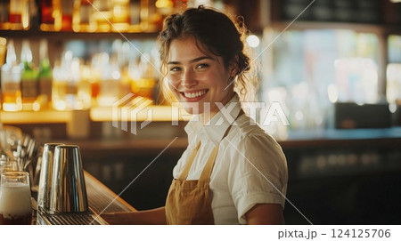 Beautiful female barista in white shirt and brown apron smiling at camera. Warm cafe atmosphere with bokeh lights. Professional service industry portrait with authentic emotions 124125706