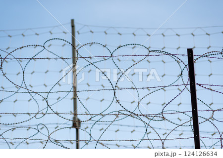 Barbwire at the DMZ Korean Demilitarized Zone that separates North and South Korea in Paju, South Korea 124126634