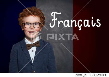 School child boy on French flag with the inscription Francais in French 124129011
