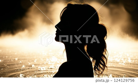 beautiful young woman on the beach 124129756