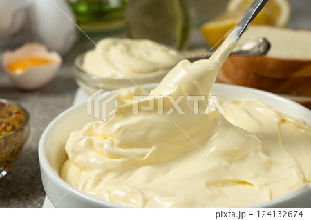 Classic traditional white mayonnaise in a bowl Classic traditional white mayonnaise in a bowl 124132674