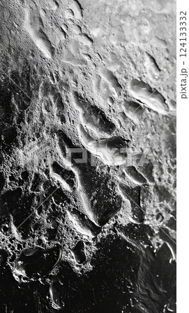 wet and textured black surface with water droplets and streaks, creating a dramatic contrast wet and textured black surface with water droplets and streaks, creating a dramatic contrast 124133332