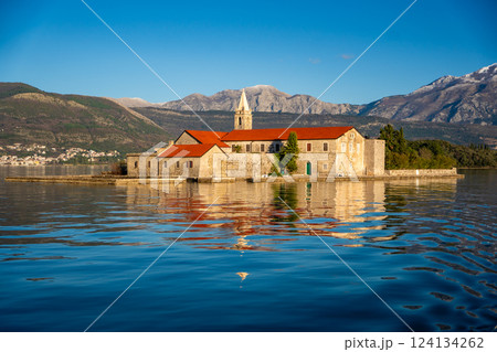 View of Our Lady of Mercy Island from yacht boat near Tivat city in Kotor bay of Adriatic sea in Montenegro in winter time View of Our Lady of Mercy Island from yacht boat near Tivat city in Kotor bay of Adriatic sea in Montenegro in winter time 124134262