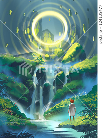 Adventurer witnessing a glowing ring above a waterfall 124135477