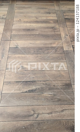 Rustic Wooden Flooring Features Stunningly Textured Planks That Enhance Home Aesthetics and Comfort 124137188