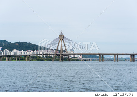Grand Olympic Bridge, in the shape of the Olympic torch, over the Han River in Seoul, capital of South Korea Grand Olympic Bridge, in the shape of the Olympic torch, over the Han River in Seoul, capital of South Korea 124137373