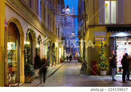 New Year's illuminated streets of Parma at evening, Italy 124139617