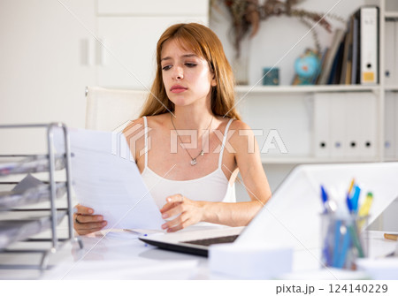 Angry female manager experiencing emotions in modern office 124140229