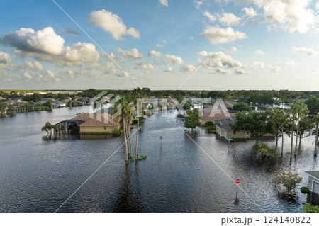 Flooding in Florida caused by tropical storm from hurricane Debby. Suburb houses in Laurel Meadows residential community surrounded by flood waters in Sarasota. Aftermath of natural disaster 124140822