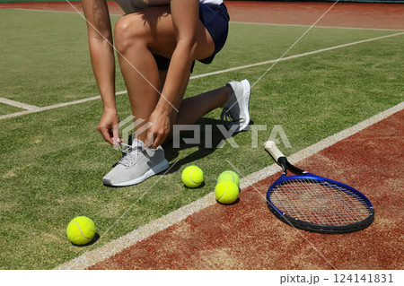 The main attributes of big tennis, racket and ball. 124141831