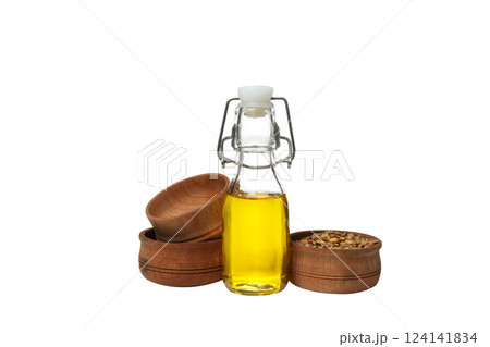 PNG, Oil in a glass bottle and bowls with sunflower seeds, isolated on white background 124141834