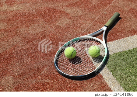 The main attributes of big tennis, racket and ball. 124141866