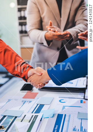 Business handshake for teamwork of business merger and acquisition,successful negotiate,hand shake,two businessman shake hand with partner to celebration partnership and business deal concept 124143817