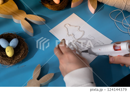 EASTER angel painting with phrase HE IS RISEN Sustainable preparation Diy process of making handmade greeting cards. Step by step activity for children. Inclusive and responsible stress relief holiday 124144379