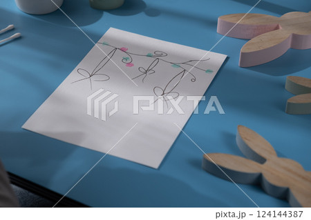 Drawing Easter eggs Storytelling of creating craft Easter greeting card holiday present. Tactile hand-on activity. Master class progress of creative me-made gifts. Seasonal domestic life micro moment 124144387