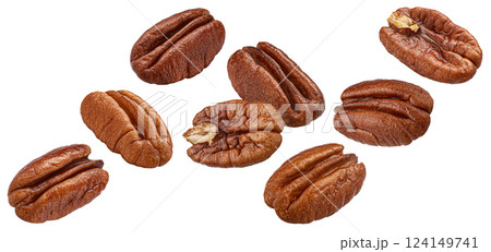 Falling pecan nuts isolated on white background with clipping path, package design element Falling pecan nuts isolated on white background with clipping path, package design element 124149741